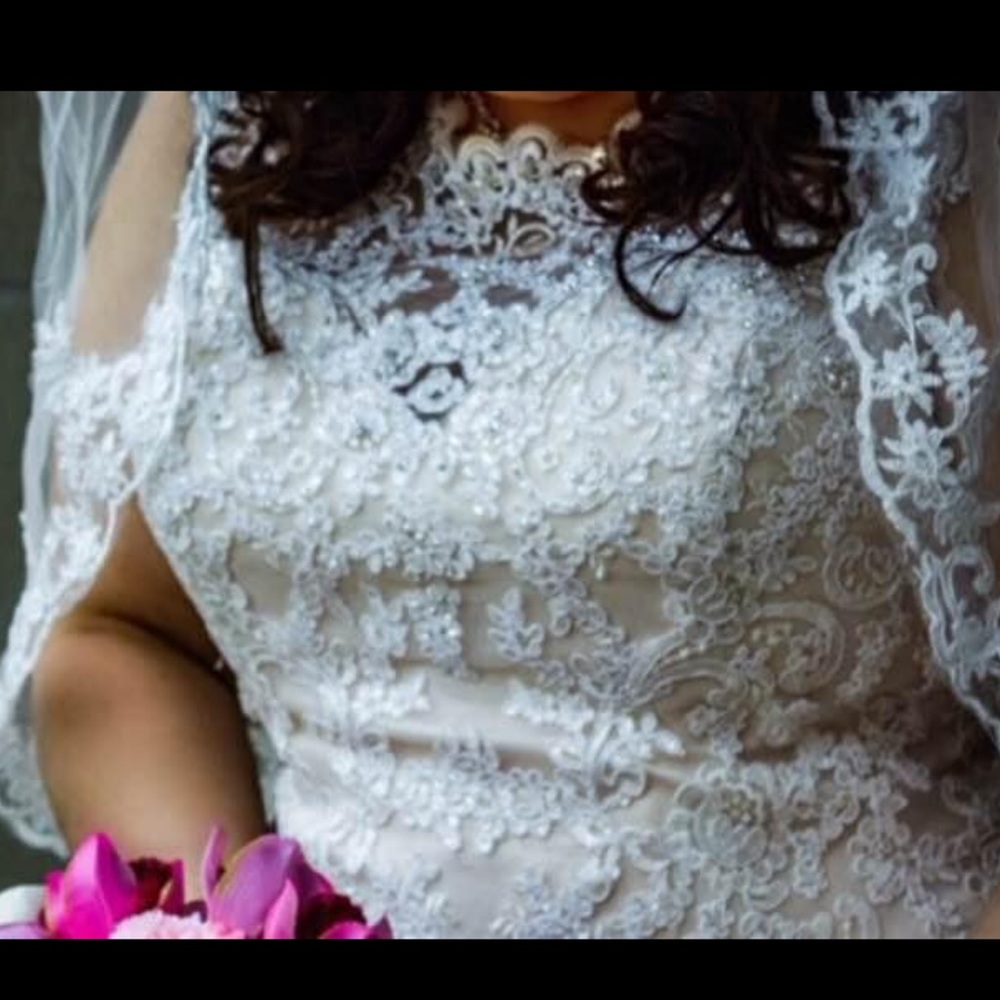 Azteca Boutique from  AZ wedding dress Champaign